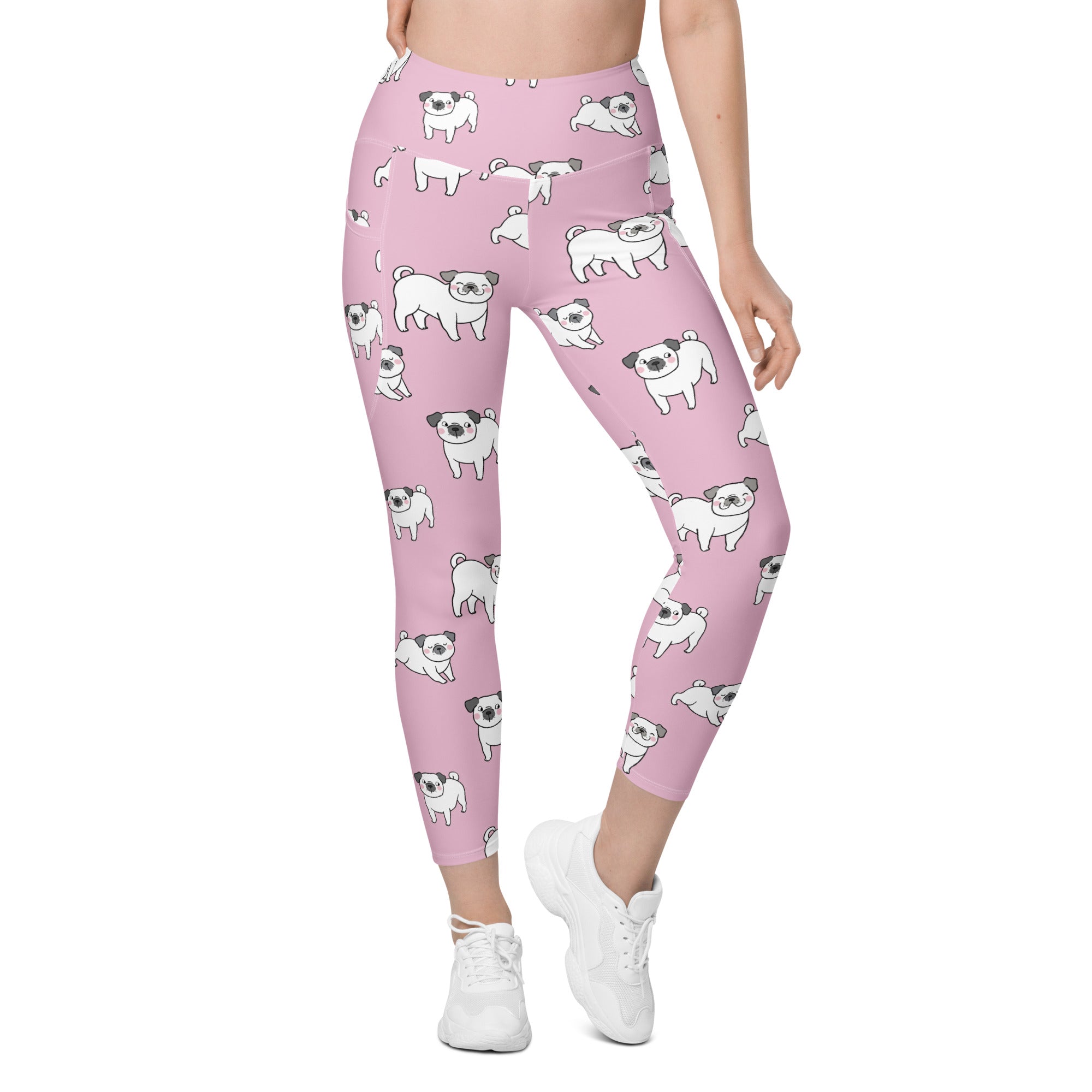 Women’s pink high-waisted soft compression yoga leggings with pockets featuring a white cartoon pug pattern