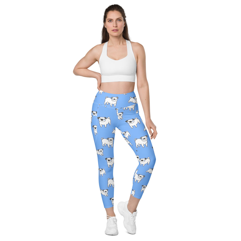 Women’s light blue high-waisted yoga leggings with soft compression and pockets featuring white cartoon pug pattern