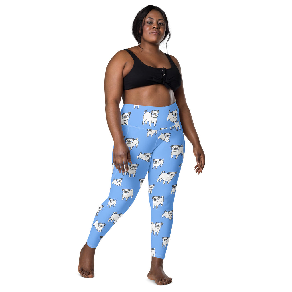 Women’s light blue high-waisted yoga leggings with soft compression and white pug illustrations with pockets