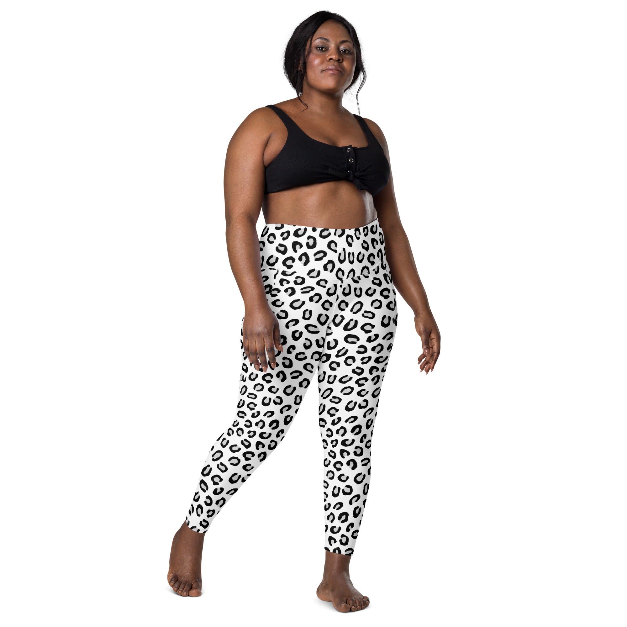 Black and white leopard print high-waisted yoga leggings with pockets soft compression active pants for women
