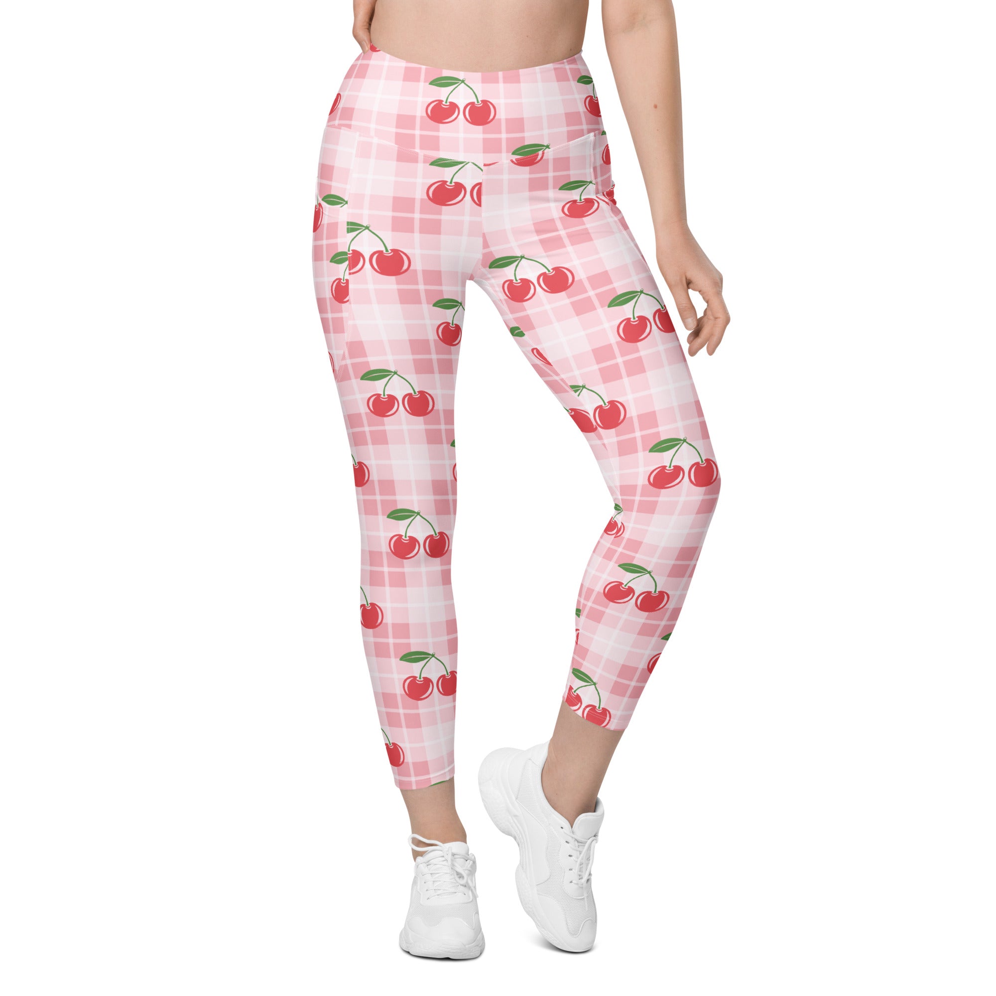 Women’s high-waisted pink and white plaid cherry gingham yoga leggings with pockets and soft compression fabric