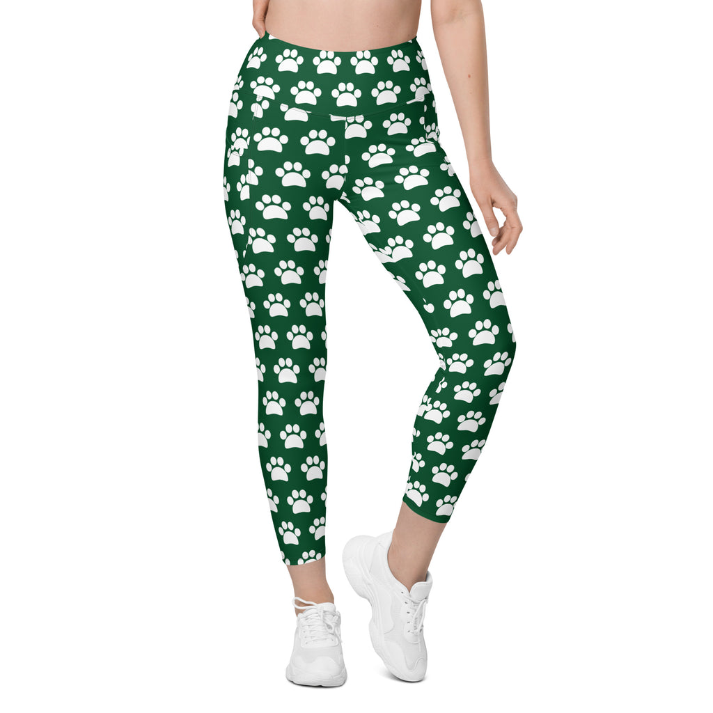 Women’s green high waisted yoga leggings with white paw print pattern soft compression and pockets