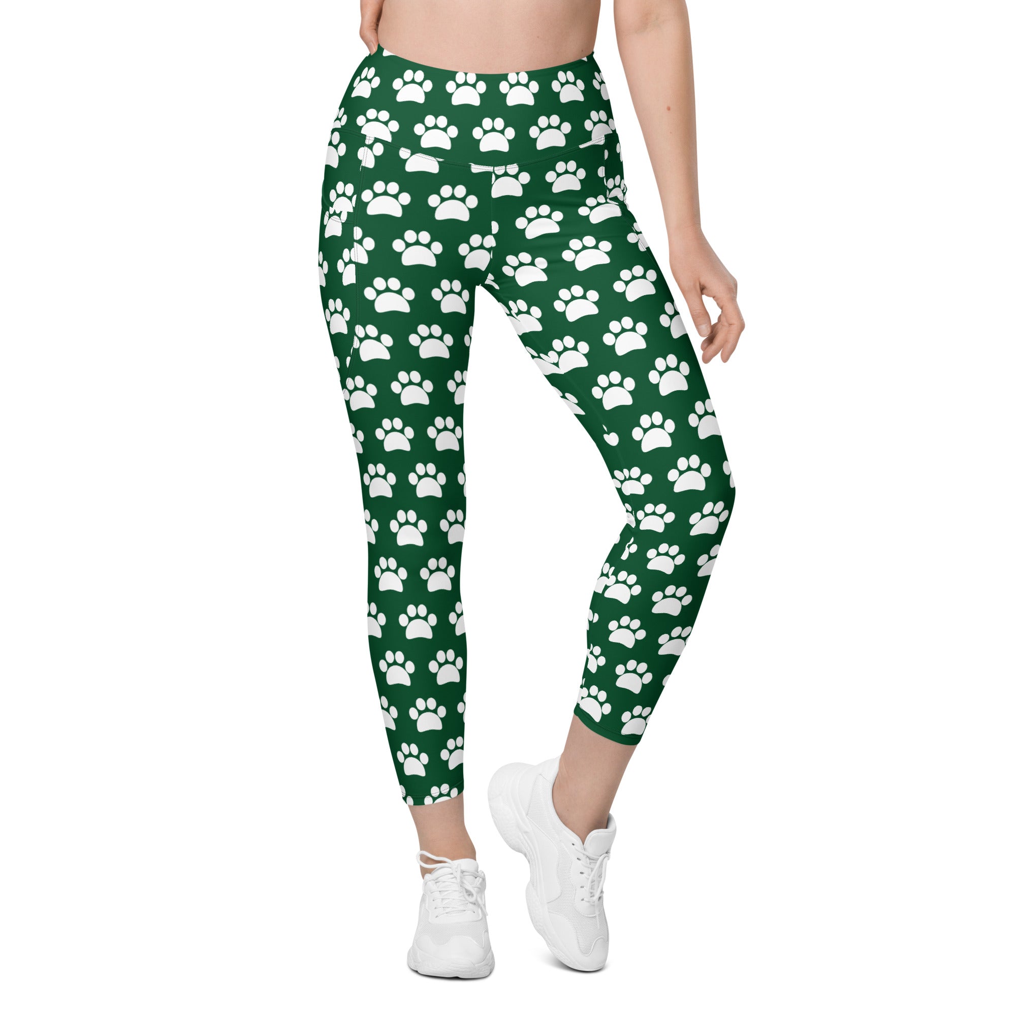 Women’s green high waisted yoga leggings with white paw print pattern soft compression and pockets