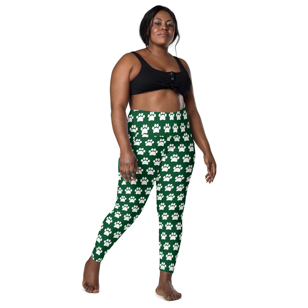 Women’s green high-waisted yoga leggings with white paw print pattern soft compression and pockets