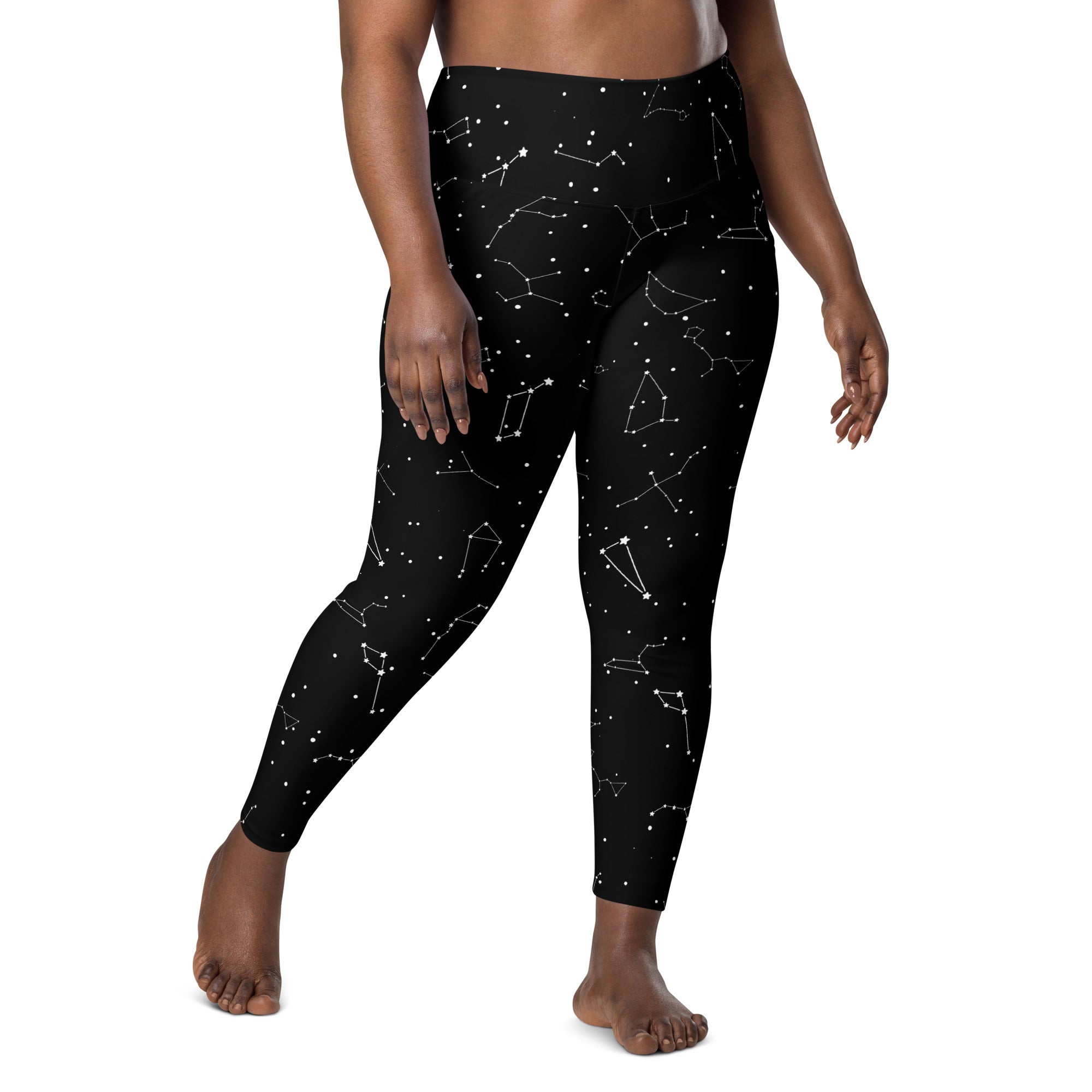 Women’s high-waisted black leggings with white constellation pattern soft compression fabric and pockets for yoga