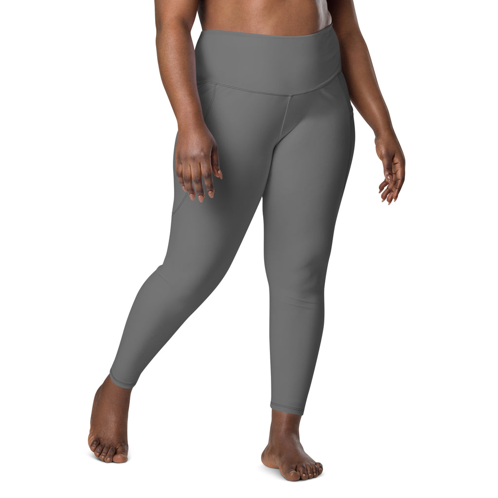 Women’s gray high-waisted yoga leggings with pockets made of soft stretchy compression fabric for active wear