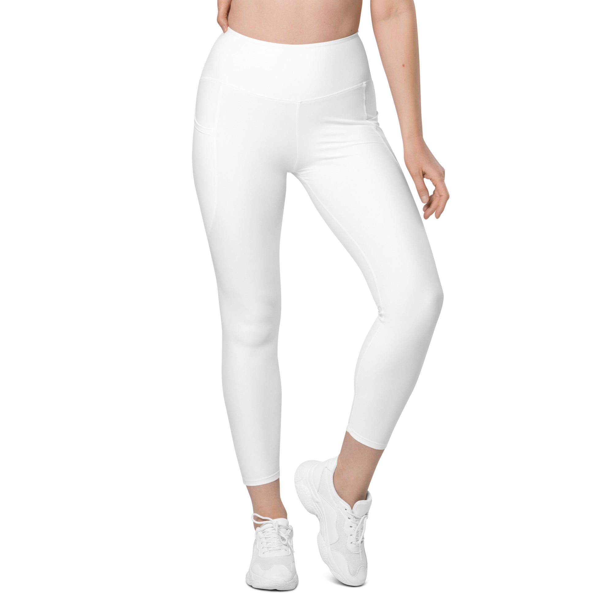 Women’s white high-waisted yoga leggings with soft compression fabric and a subtle side pocket for active use