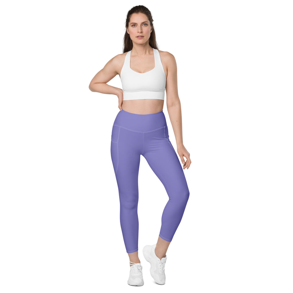 Women’s lavender high-waisted yoga leggings with pockets featuring a sleek, form-fitting design and soft compression fabric