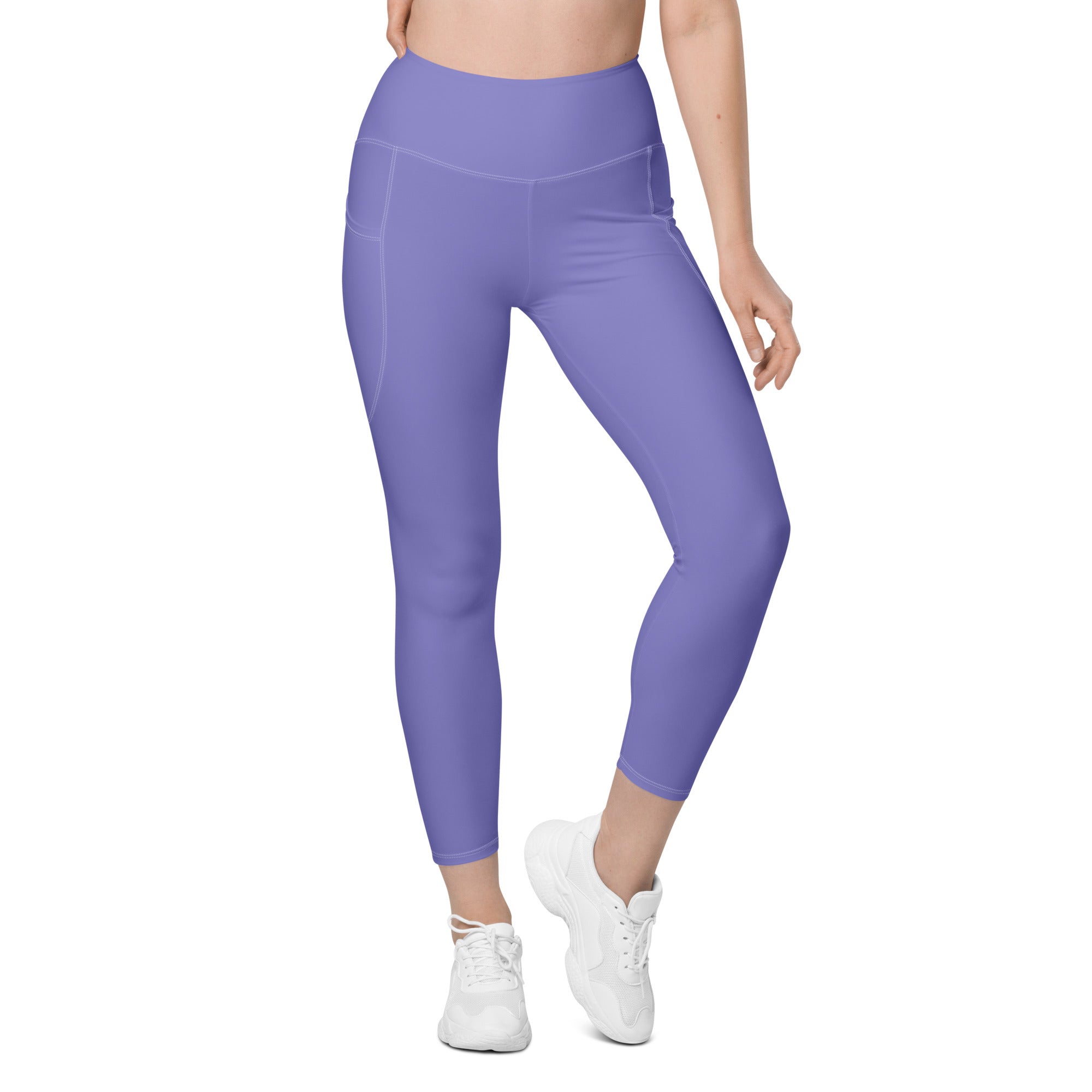 Women’s lavender high-waisted yoga leggings with soft stretchy fabric and side pockets for active use
