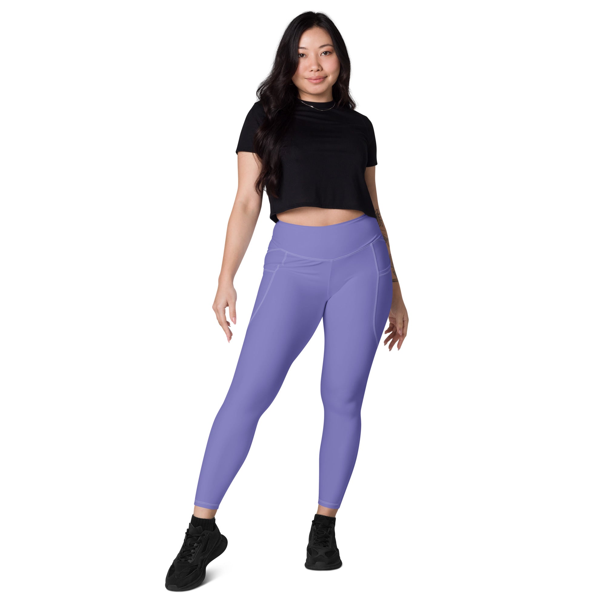 Women’s lavender high-waisted yoga leggings with pockets featuring soft compression and a sleek form-fitting design