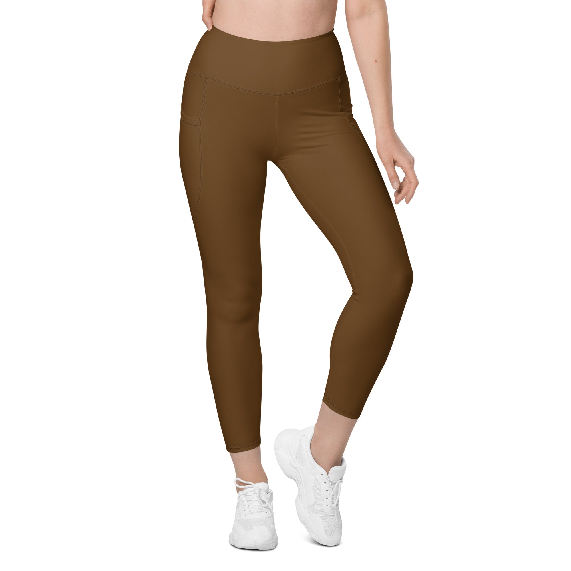 Women’s brown high-waisted yoga leggings with pockets made from smooth stretchy fabric for soft compression and active wear