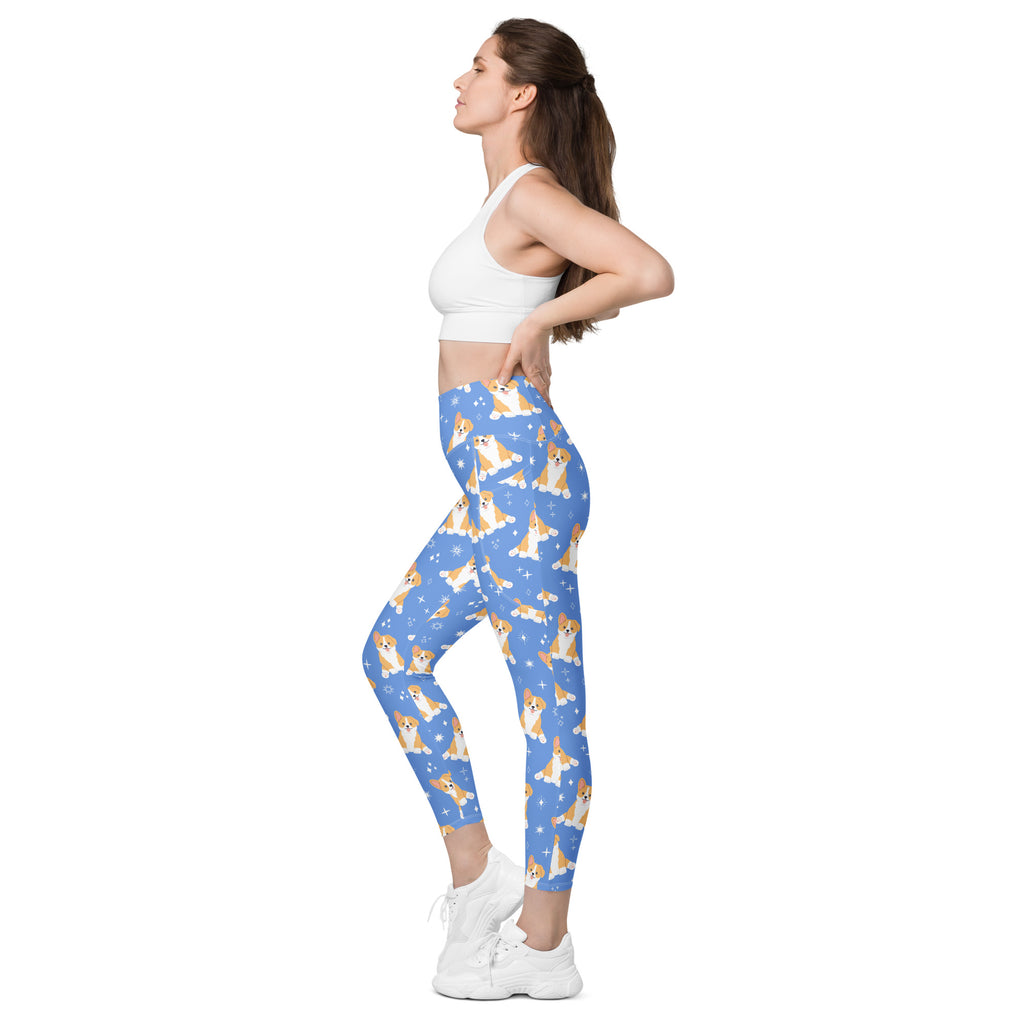 Women’s high-waisted blue corgi dog yoga leggings with pockets featuring soft compression and playful tan and white corgi pattern