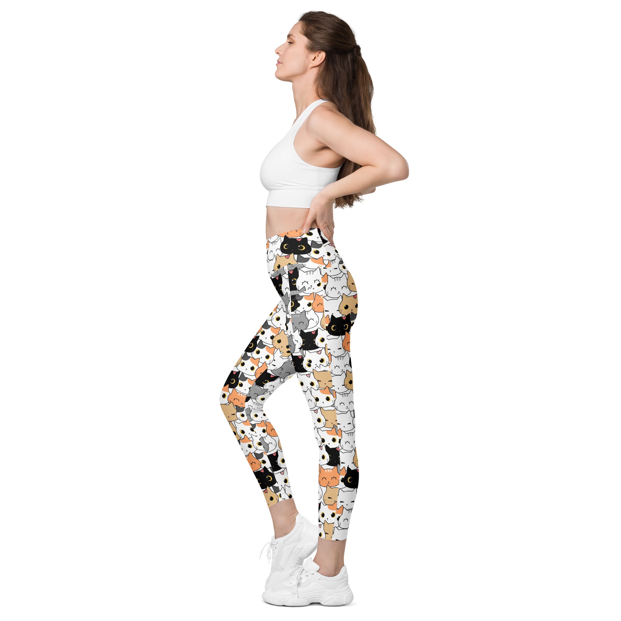 White high-waisted women’s cat face yoga leggings with pockets featuring colorful cartoon cat patterns and soft compression