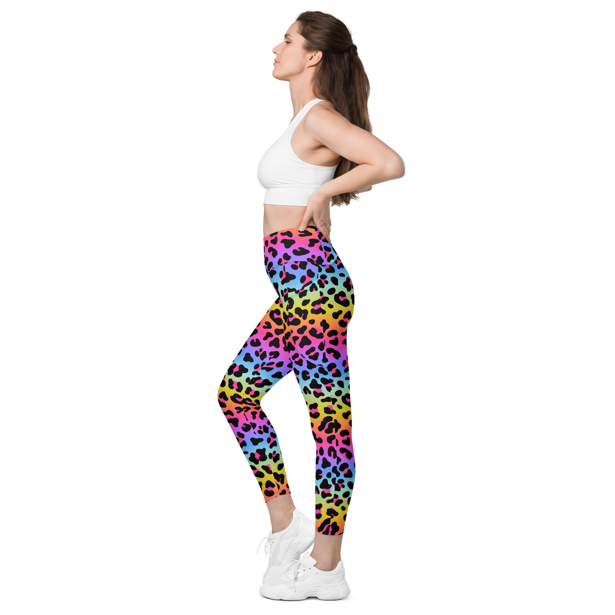 Women’s high-waisted rainbow leopard yoga leggings with pockets made of soft compression fabric for active wear
