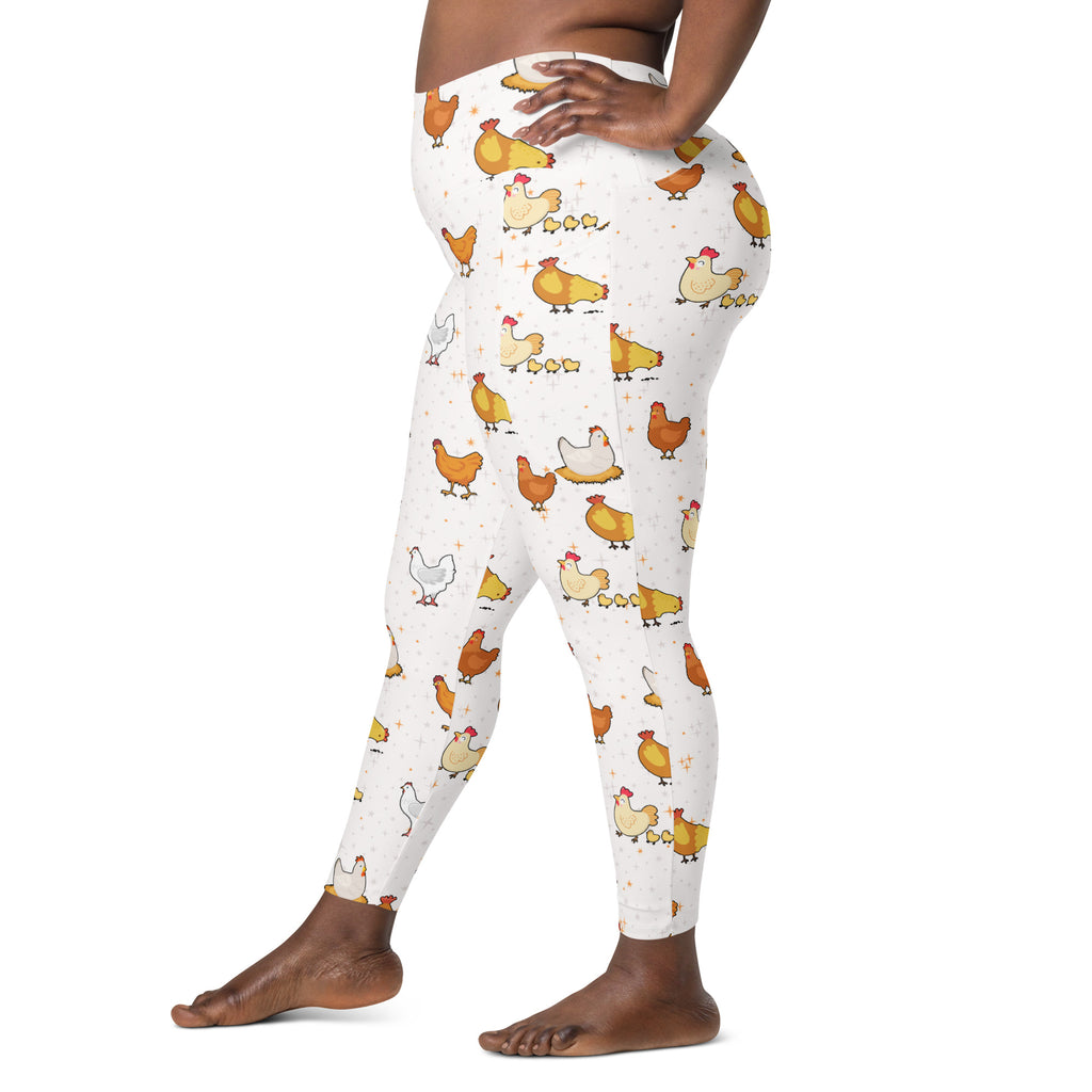 Women’s white high-waisted chicken yoga leggings with pockets featuring playful yellow brown and white cartoon chickens