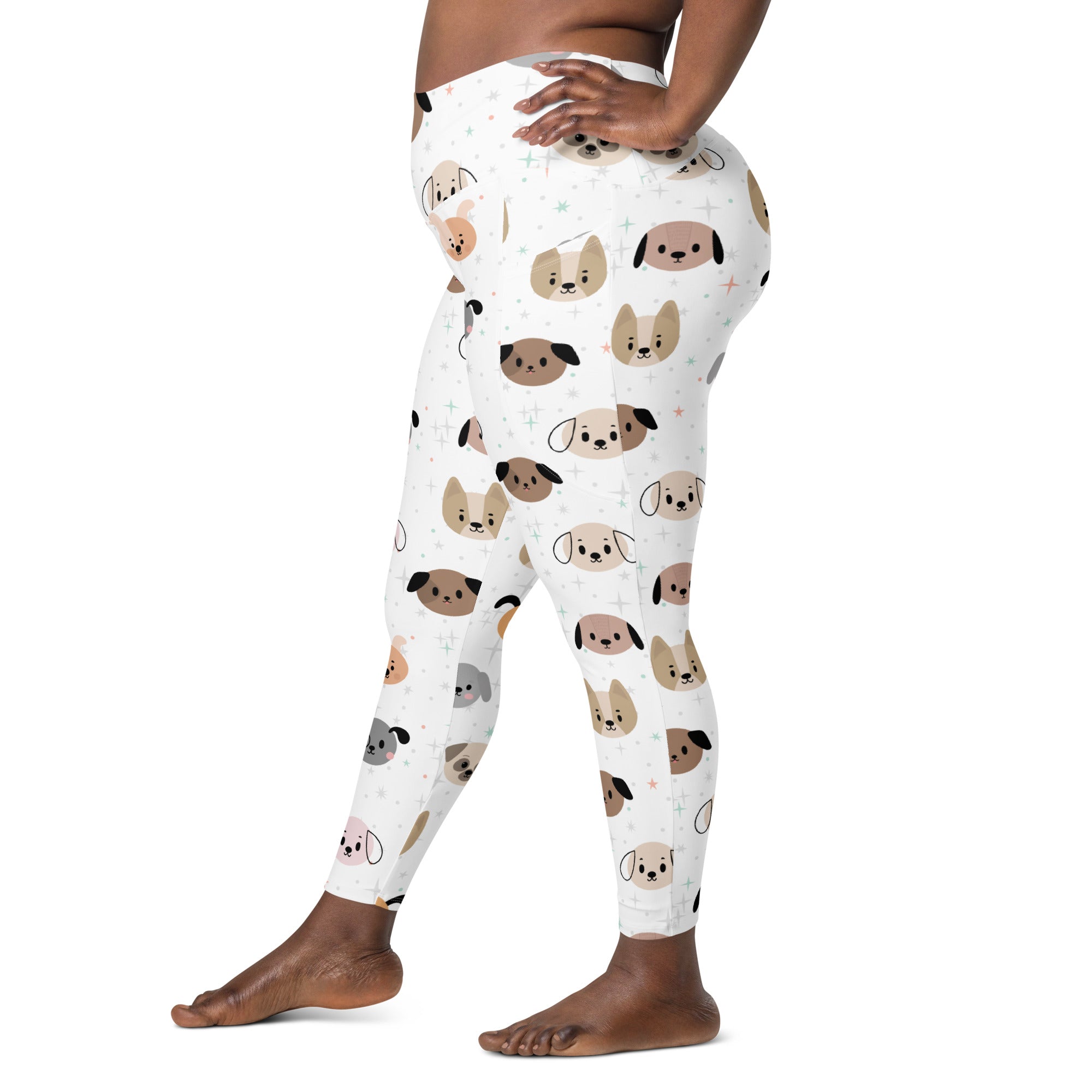 White women’s dog face yoga leggings with pockets featuring playful brown tan and gray cartoon dog patterns