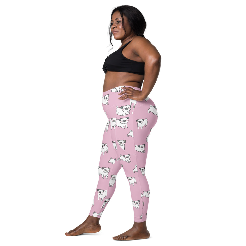 Women’s pink high-waisted yoga leggings with soft compression and white pug illustrations featuring pockets