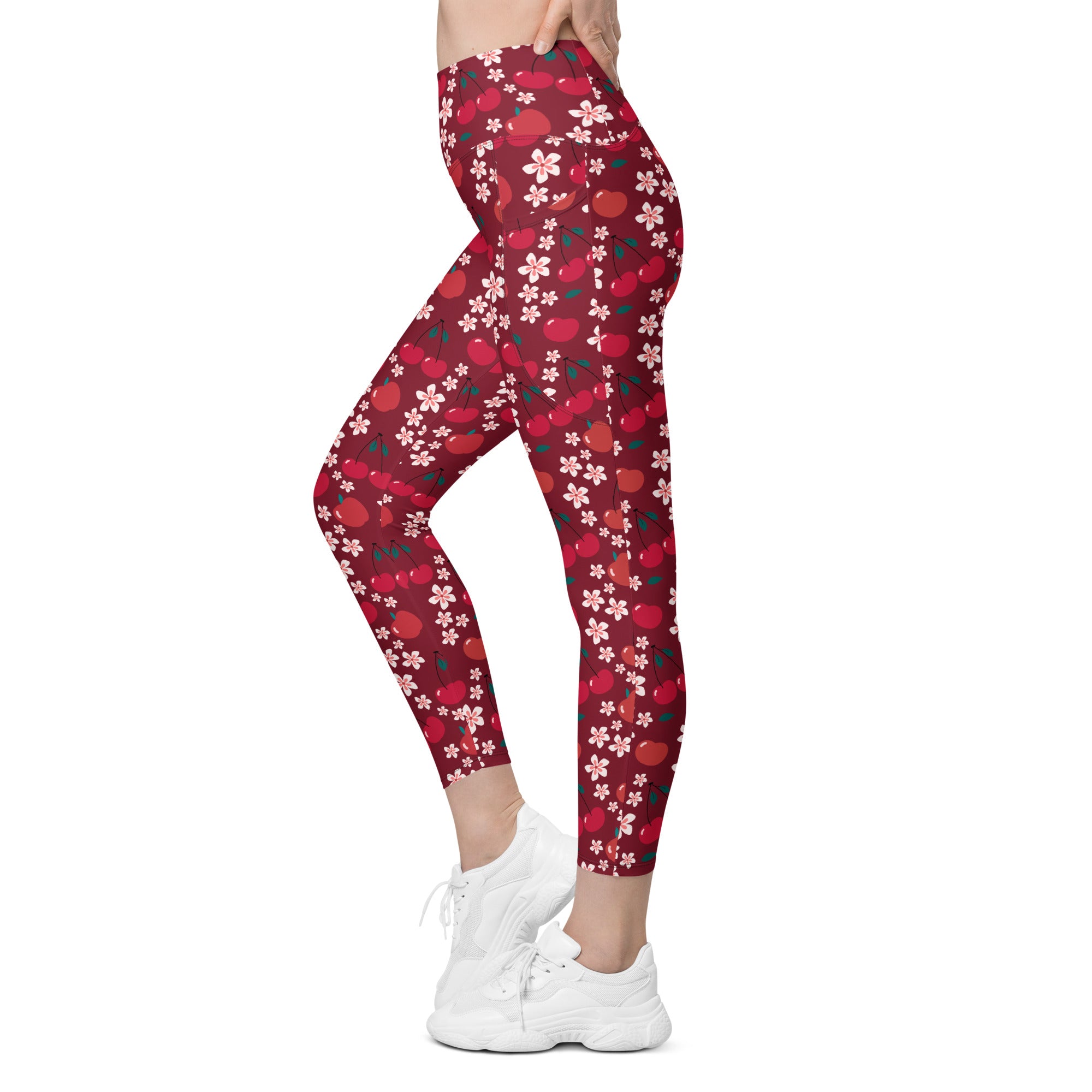 Women’s high-waisted soft compression cherry blossom yoga leggings with pockets featuring red cherry pattern