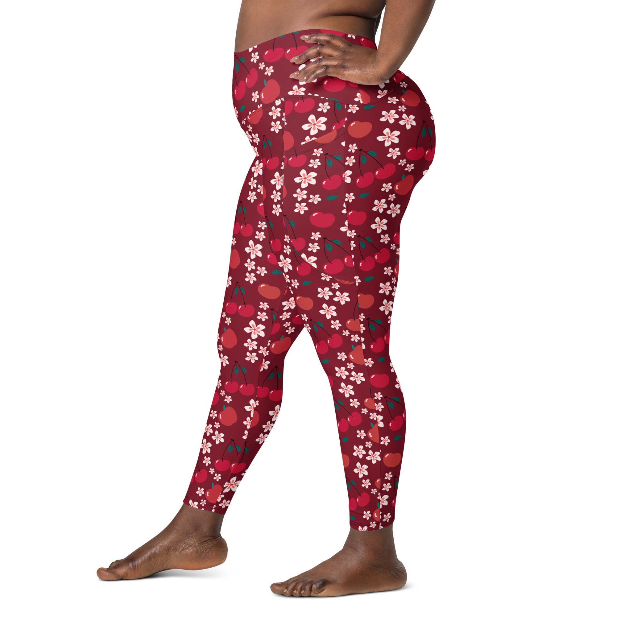 Women’s high-waisted cherry blossom yoga leggings with pockets featuring red cherry and pink flower pattern