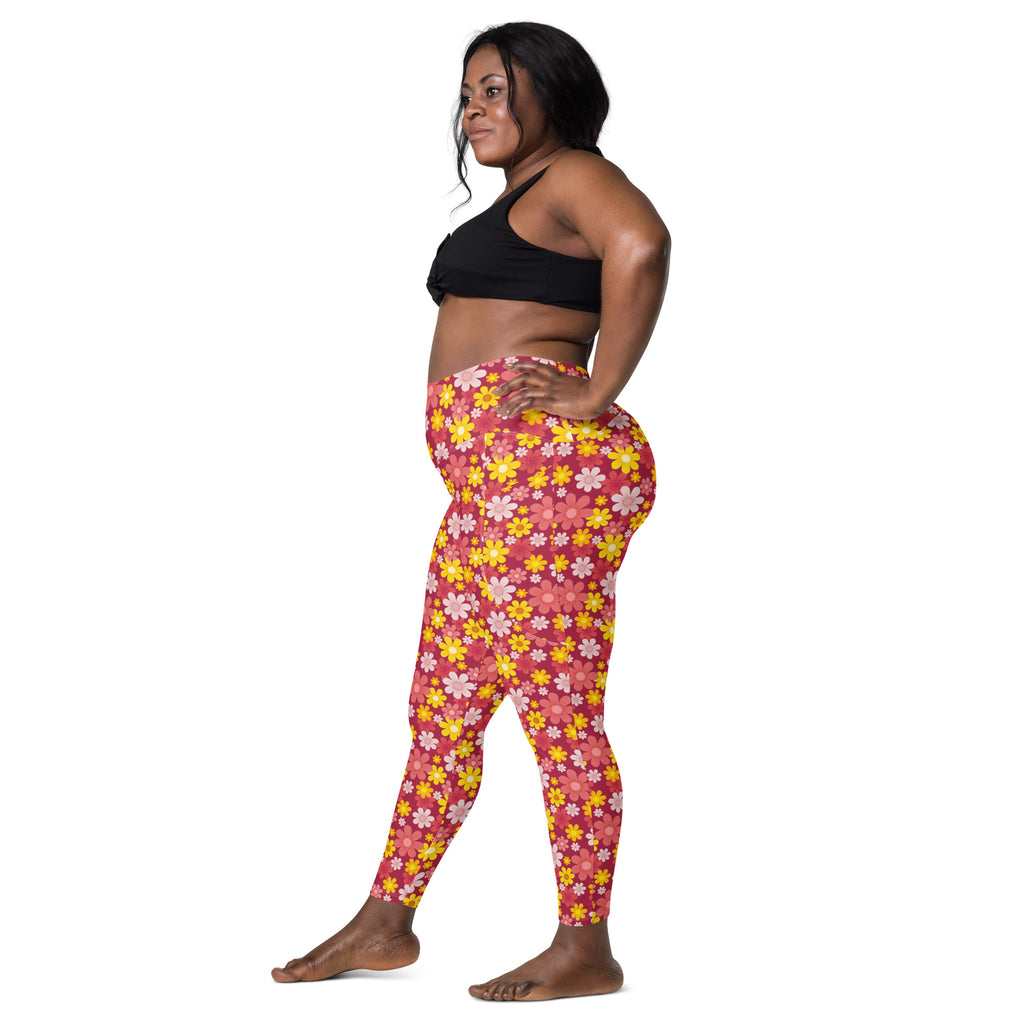 Women’s red high-waisted floral yoga leggings with soft compression and pockets featuring pink yellow and white flowers