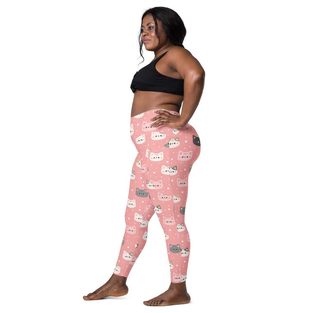 Women’s pink high-waisted yoga leggings with soft compression and white gray cartoon cat face pattern with pockets