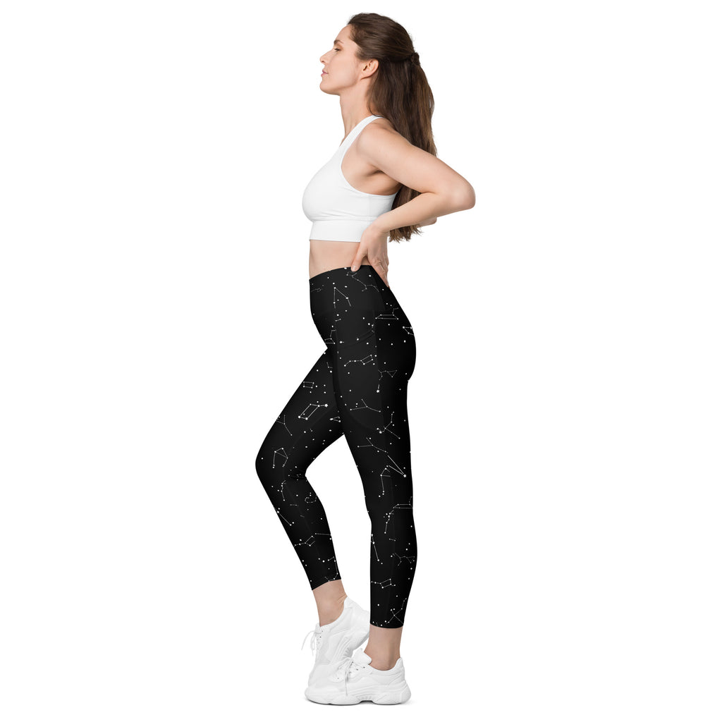 Women’s high-waisted black leggings with white constellation pattern soft compression fabric and pockets for yoga