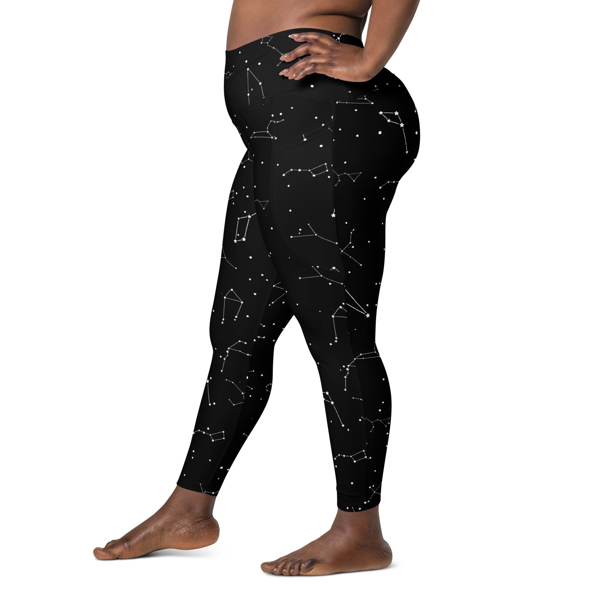 Women’s high-waisted black leggings with white constellation pattern soft compression fabric and pockets for yoga