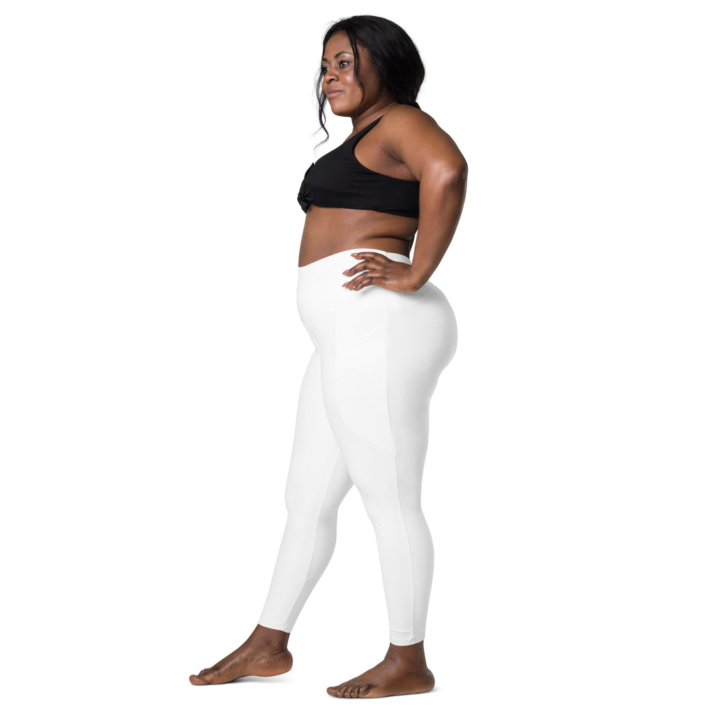 Women’s white high-waisted yoga leggings with pockets made of soft compression fabric for active wear