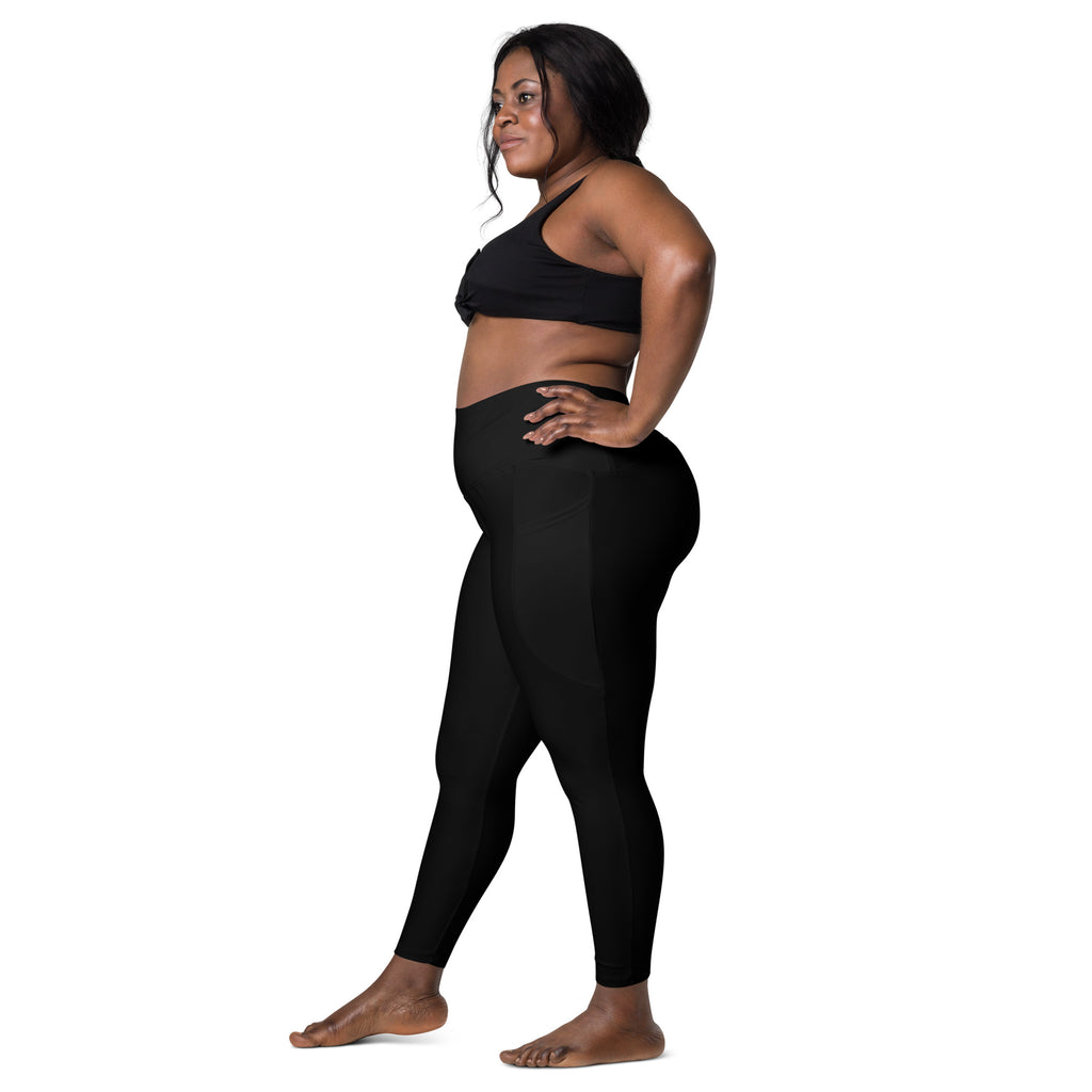 Women’s black high-waisted yoga leggings with pockets featuring a smooth, soft compression, form-fitting design