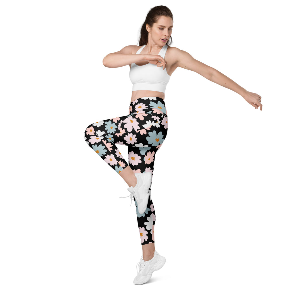 Women’s retro floral yoga leggings with pockets black with vibrant pink light blue and white daisy pattern