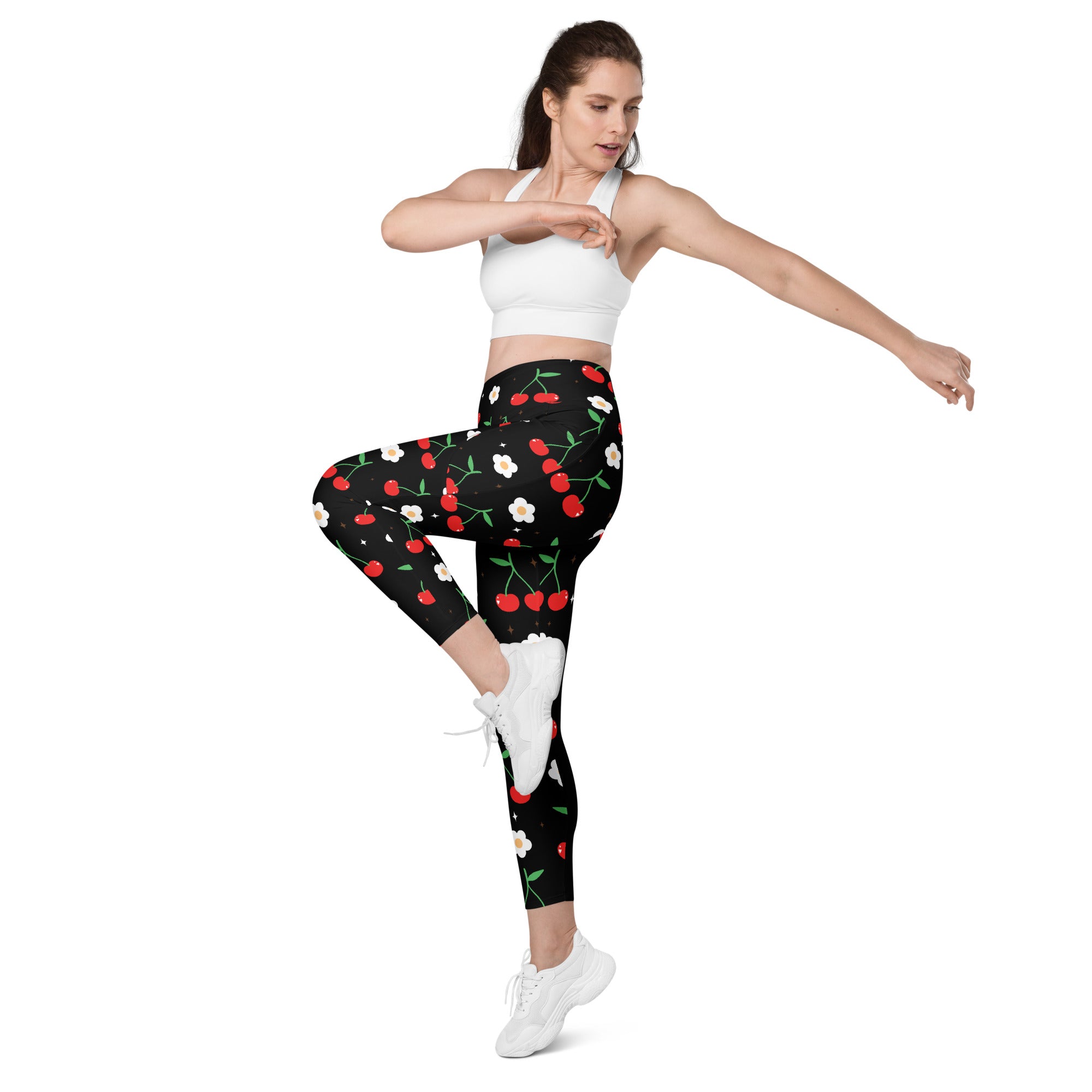Women’s high-waisted black cherry print yoga leggings with pockets featuring vibrant red cherries and white flowers