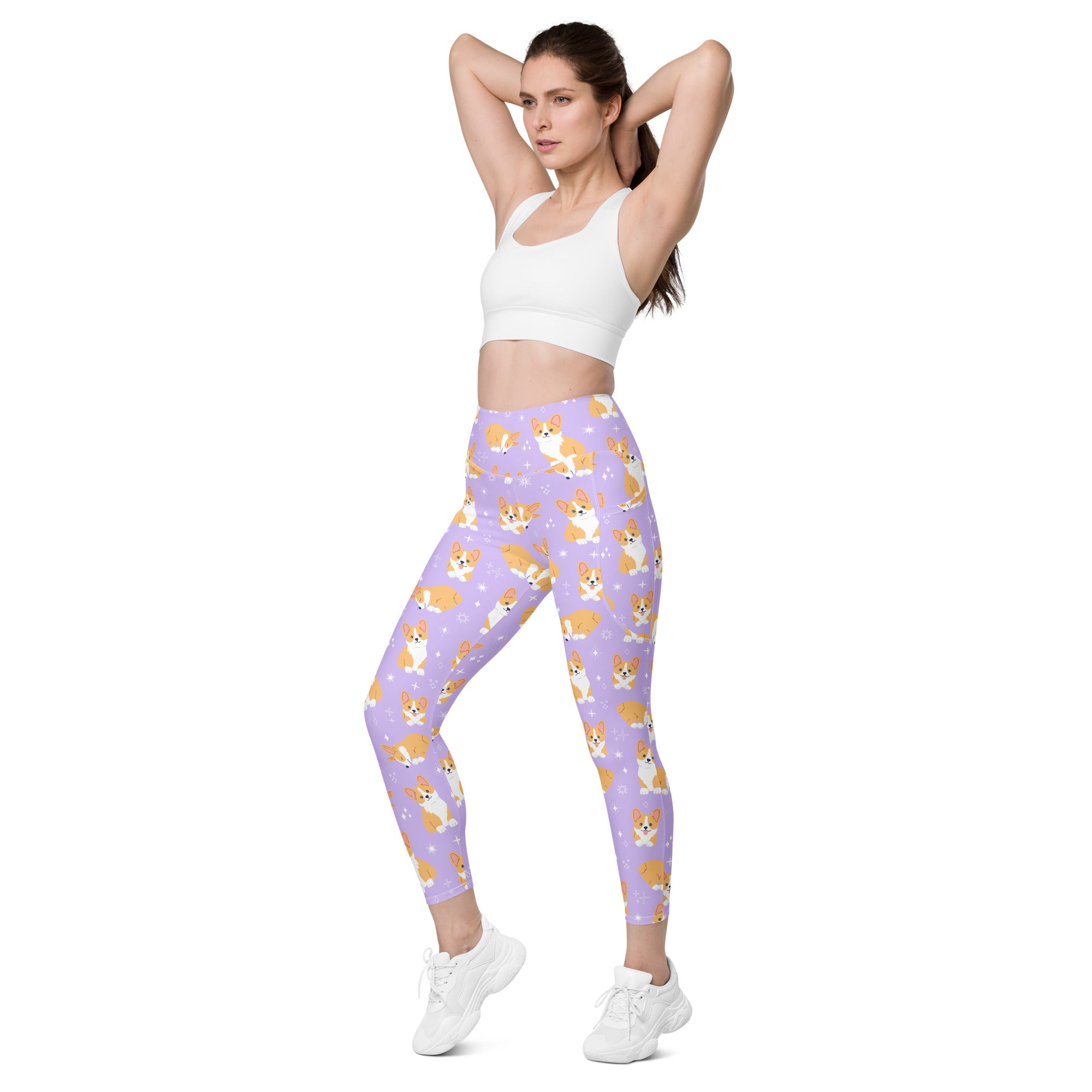 Women’s high-waisted purple yoga leggings with soft compression and orange and white corgi dog pattern with pockets