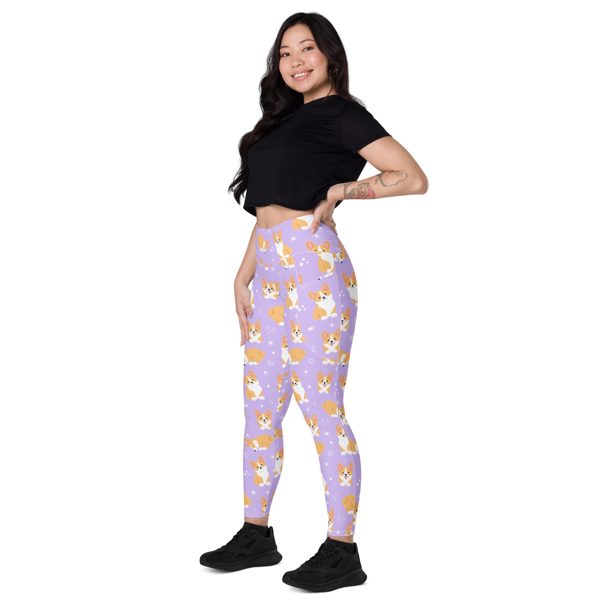 Women’s purple high-waisted lavender yoga leggings with soft compression and tan and white cartoon corgi pattern