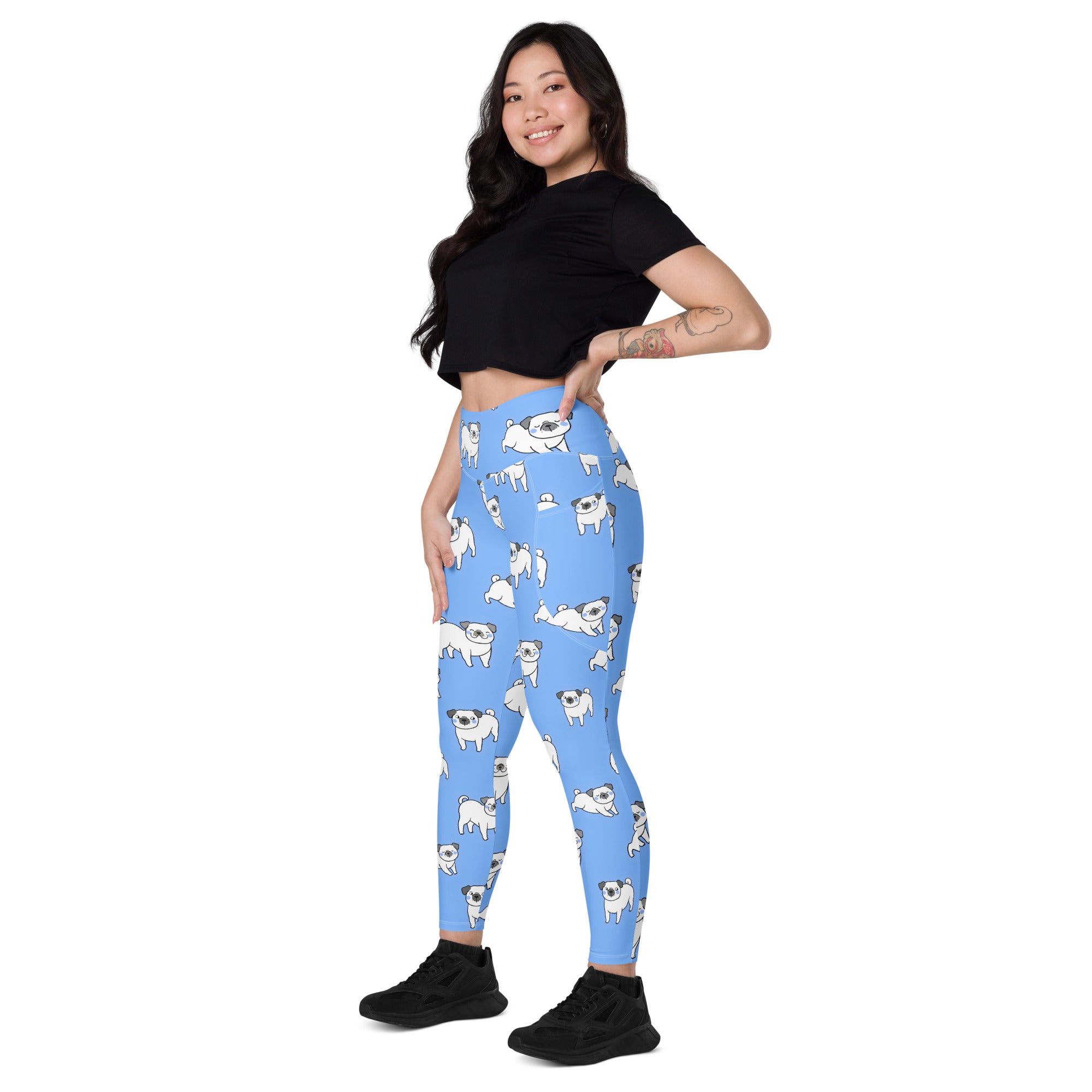 Women’s light blue high-waisted yoga leggings with pockets featuring soft compression and white pug dog pattern