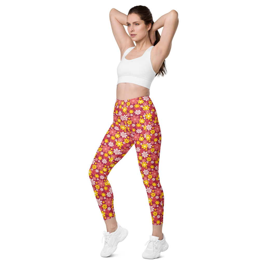 Women’s high-waisted yoga leggings with pockets in vibrant pink and yellow floral pattern soft compression fabric