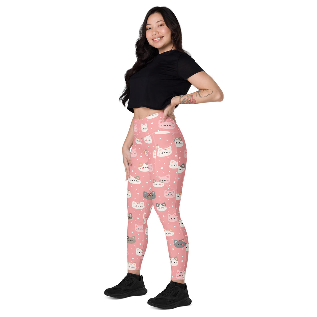 Women’s high-waisted pink cat faces yoga leggings with pockets featuring colorful cartoon cats in soft compression fabric