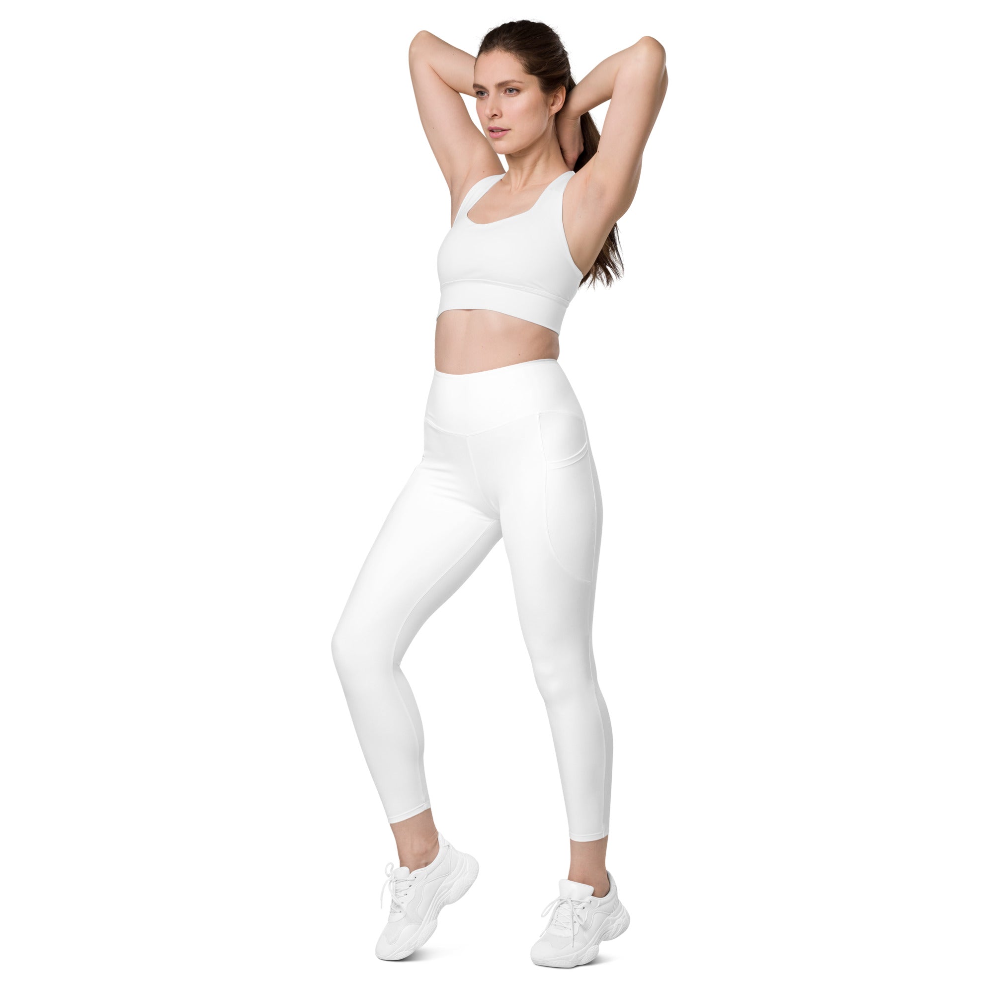 Women’s white seamless high-waisted yoga leggings with soft compression and subtle side pockets for active wear