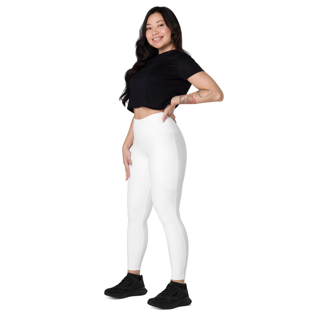 Women’s white high-waisted yoga leggings with pockets featuring soft compression for activewear use