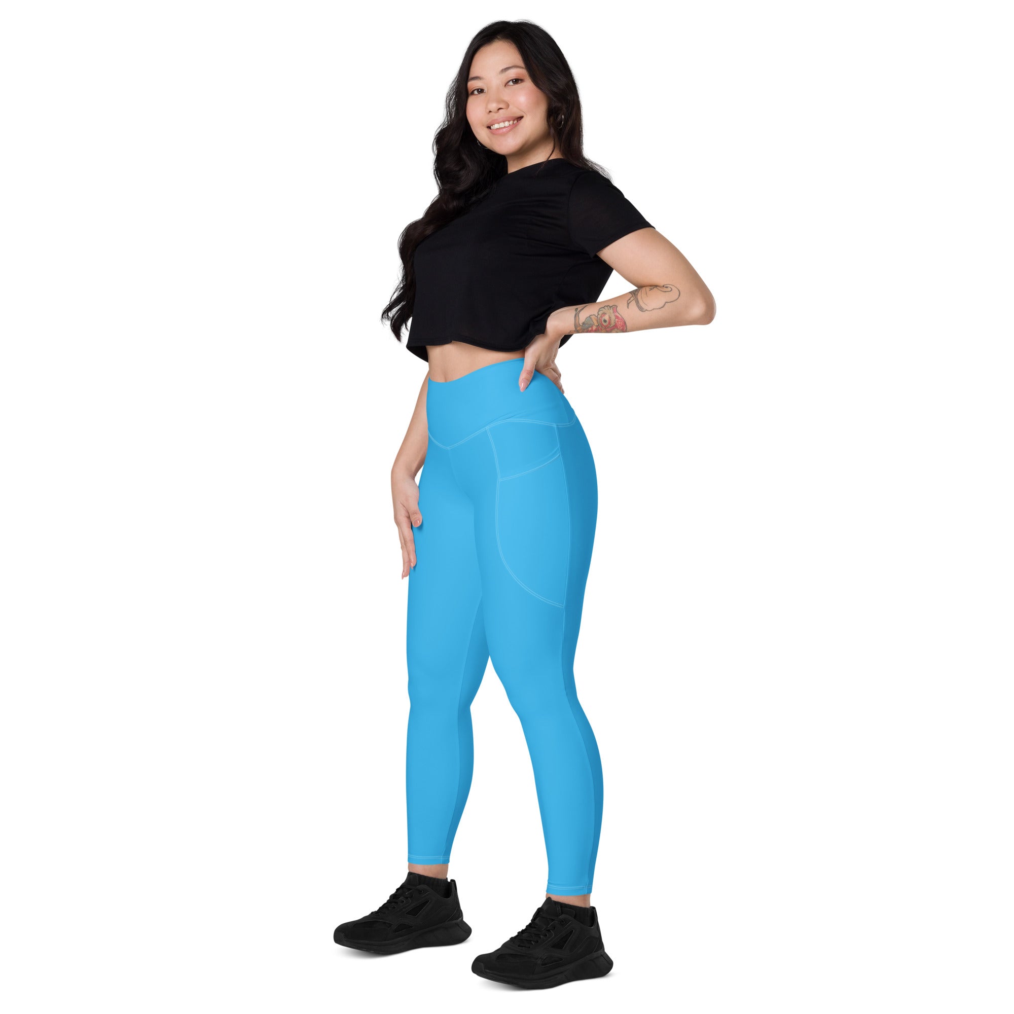 Women’s bright blue high-waisted yoga leggings with pockets soft compression and sleek form-fitting design