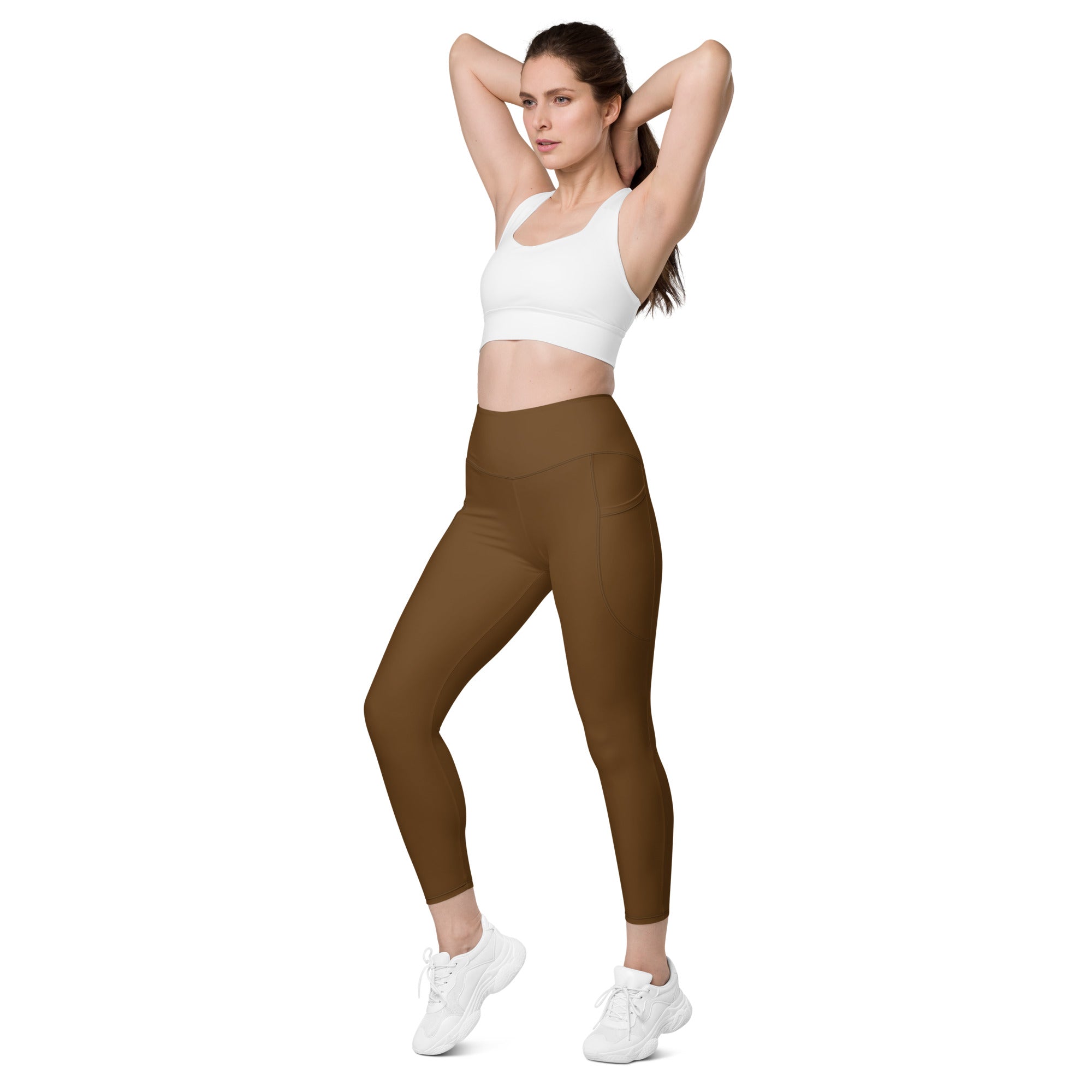 Women’s brown high-waisted yoga leggings with pockets made of smooth stretchy fabric for soft compression activewear