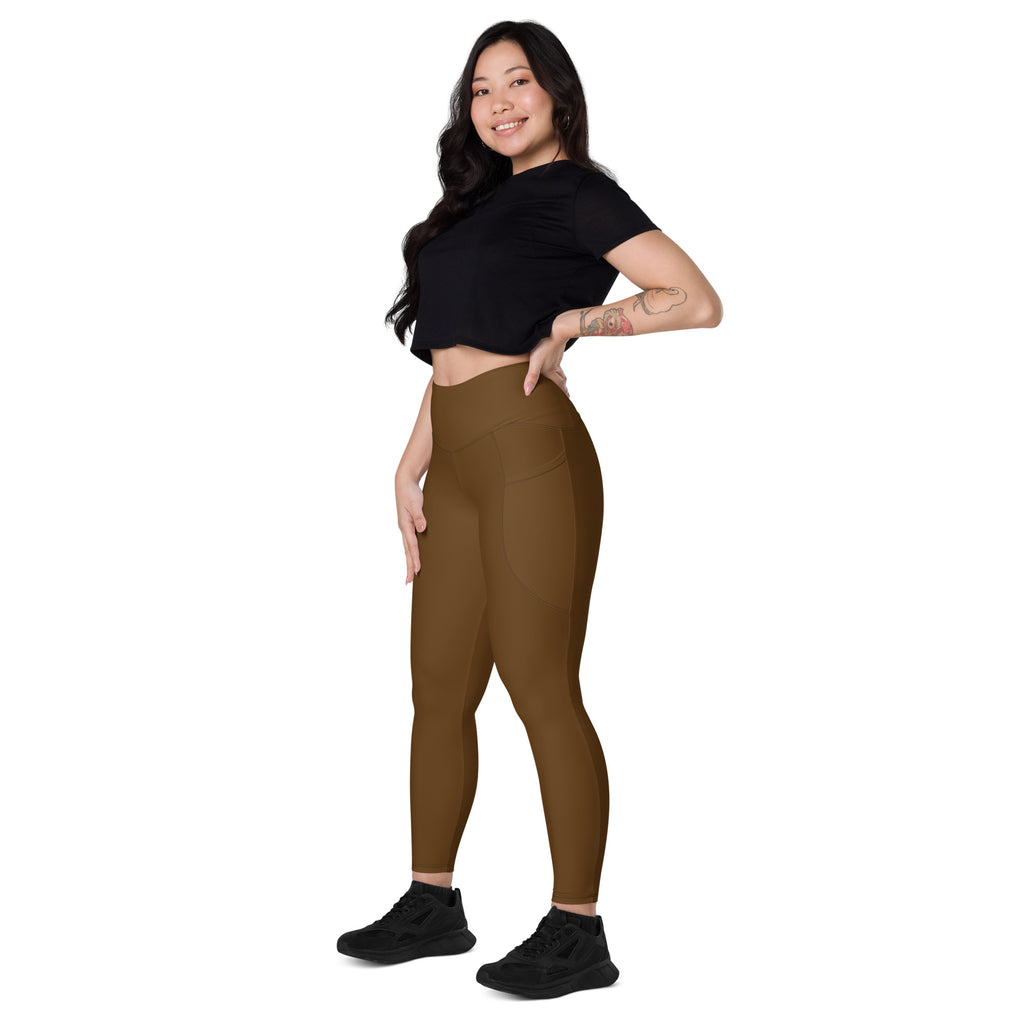 Women’s brown high-waisted yoga leggings with pockets and smooth form-fitting soft compression fabric