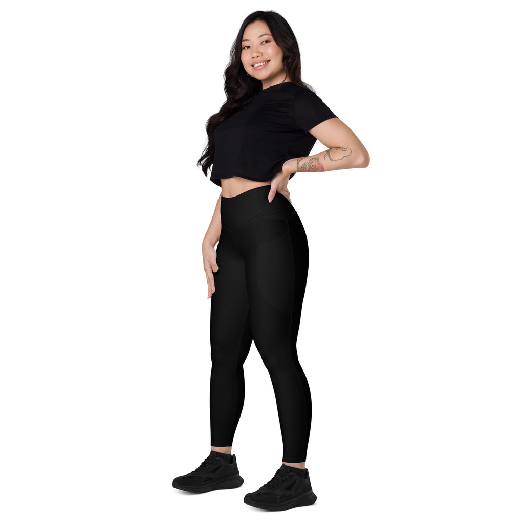 Women’s black high-waisted yoga leggings with pockets made of soft compression seamless fabric for active wear