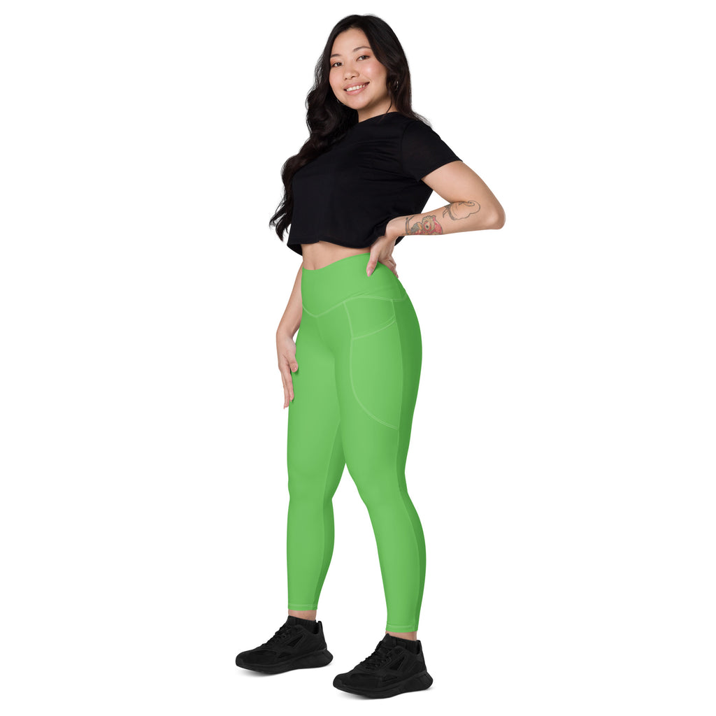 Bright green high-waisted women’s yoga leggings with pockets soft compression and a sleek form-fitting design