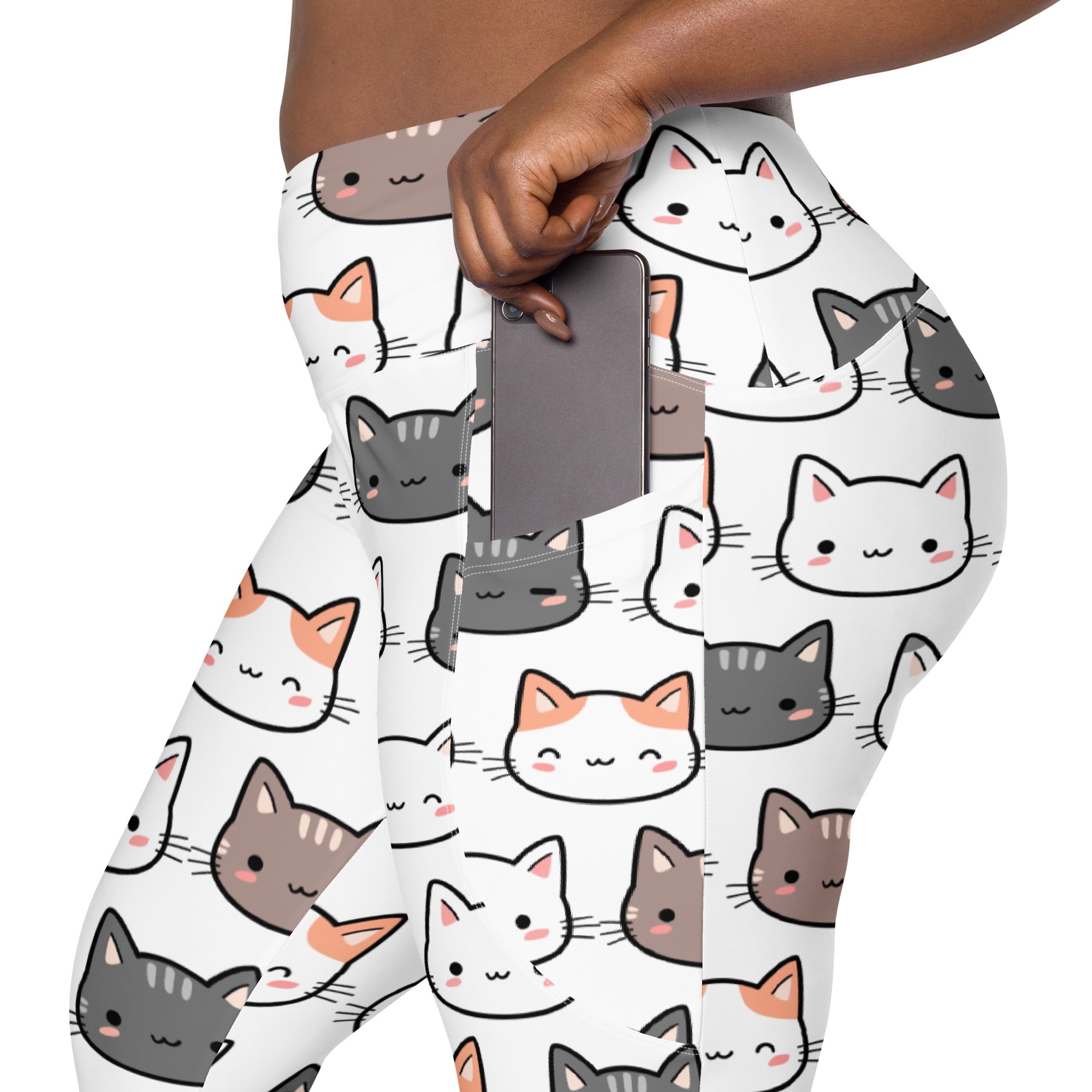 White women’s high-waisted yoga leggings with pockets featuring colorful cartoon cats with pink cheeks in soft compression fabric