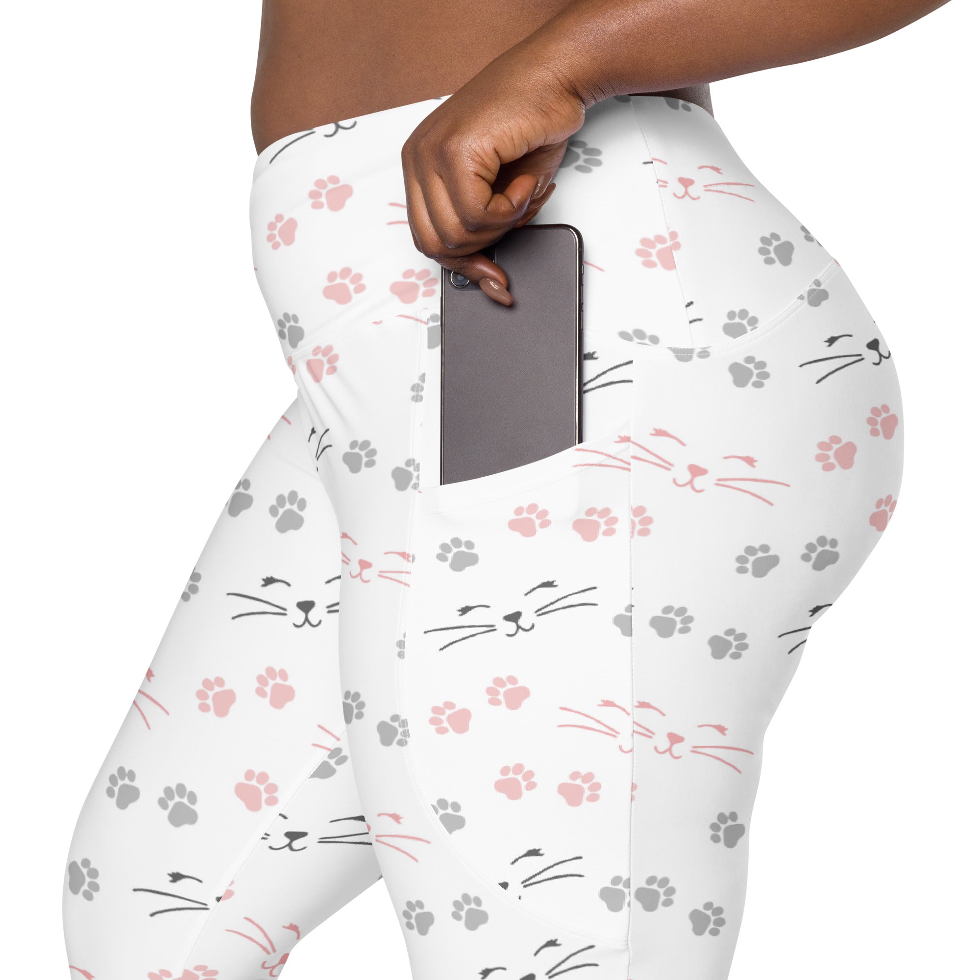 Women’s white high-waisted yoga leggings with soft compression featuring pink and gray cat faces and paw prints