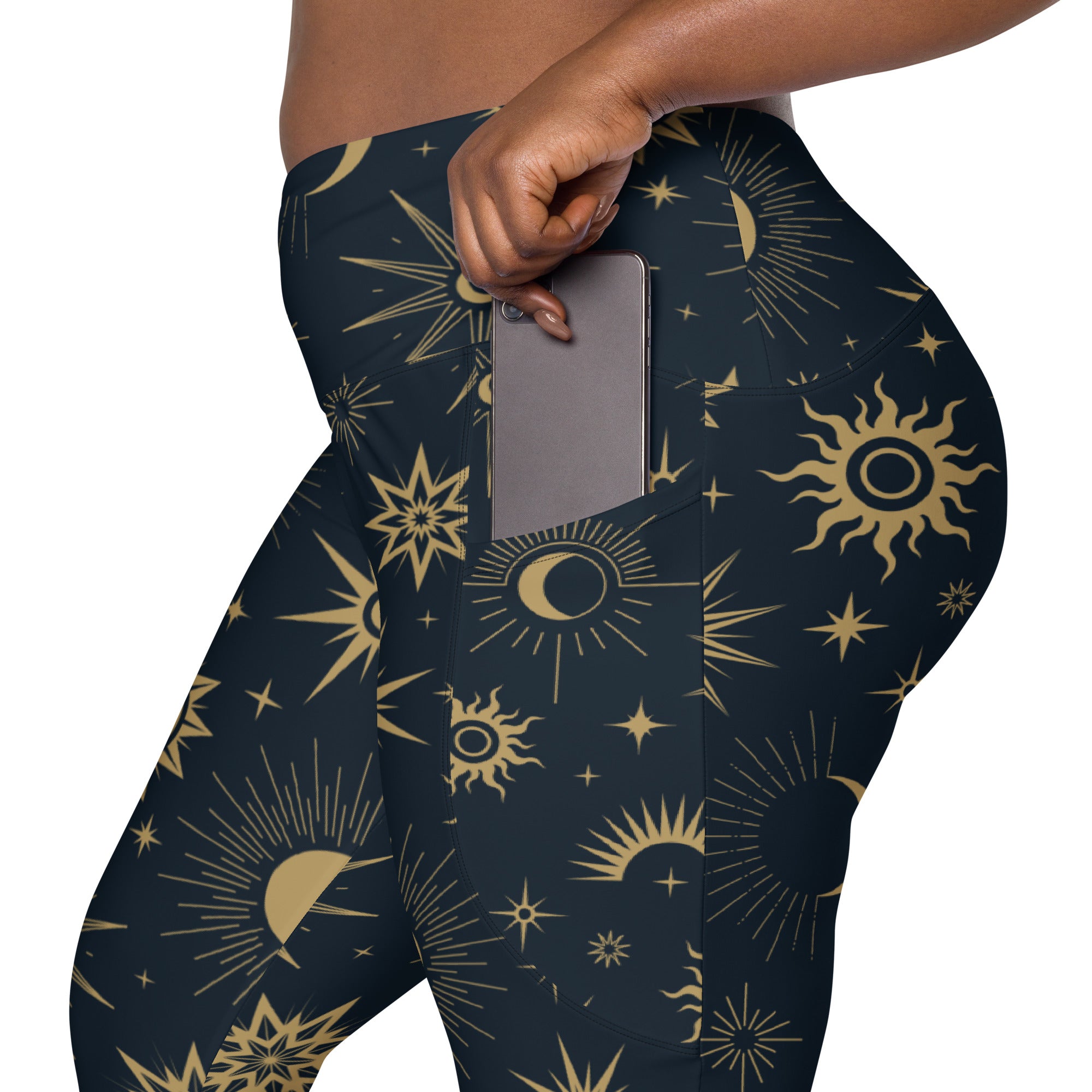 Dark blue high-waisted women’s yoga leggings with vibrant gold celestial sun moon star pattern and pockets