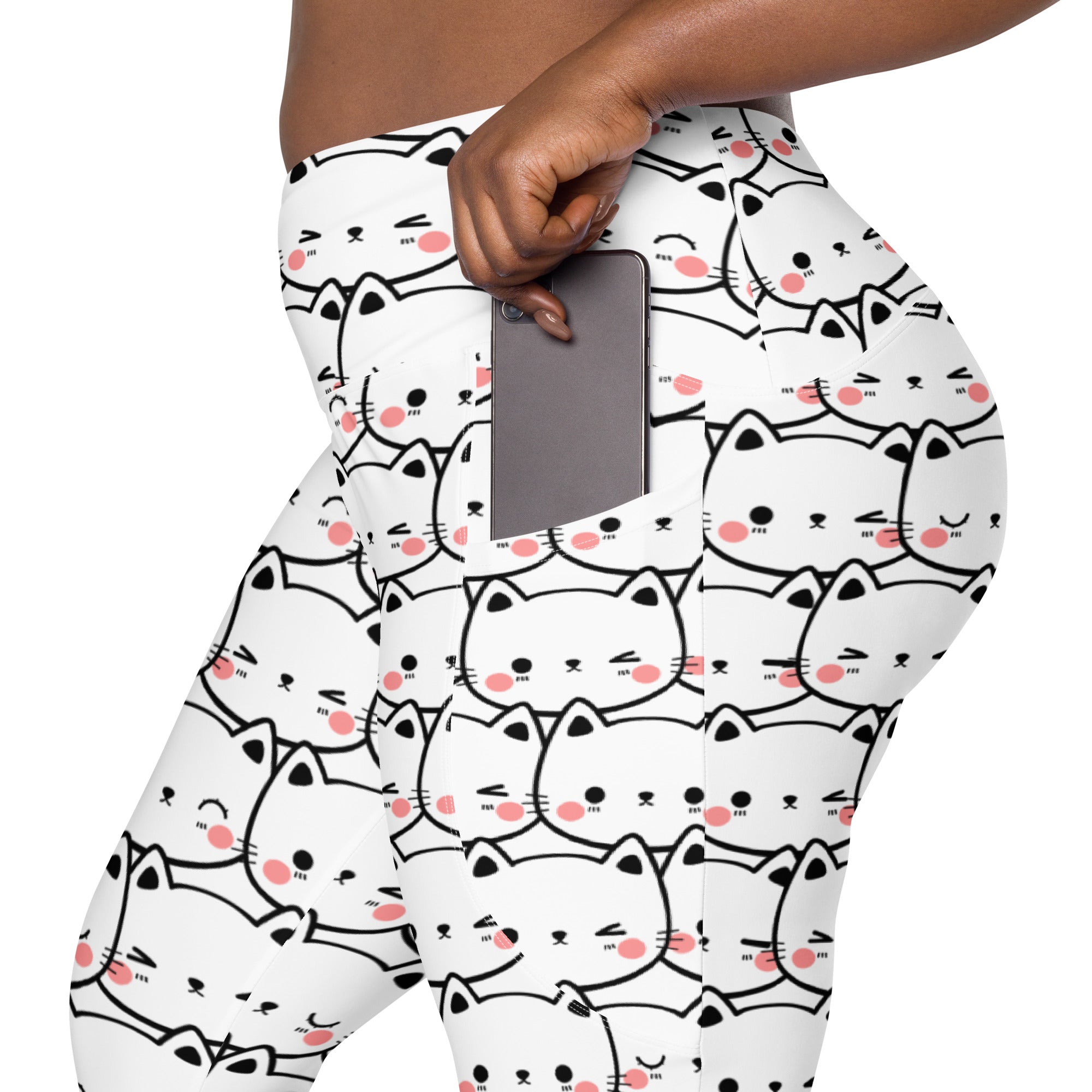 Women’s white high-waisted kawaii cat face yoga leggings with pockets featuring black-outlined cats with pink cheeks