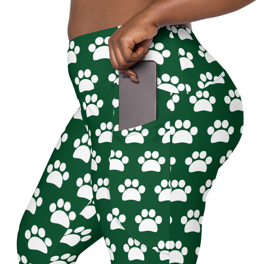 Women’s green high-waisted yoga leggings with white paw print pattern soft compression and pockets for active wear