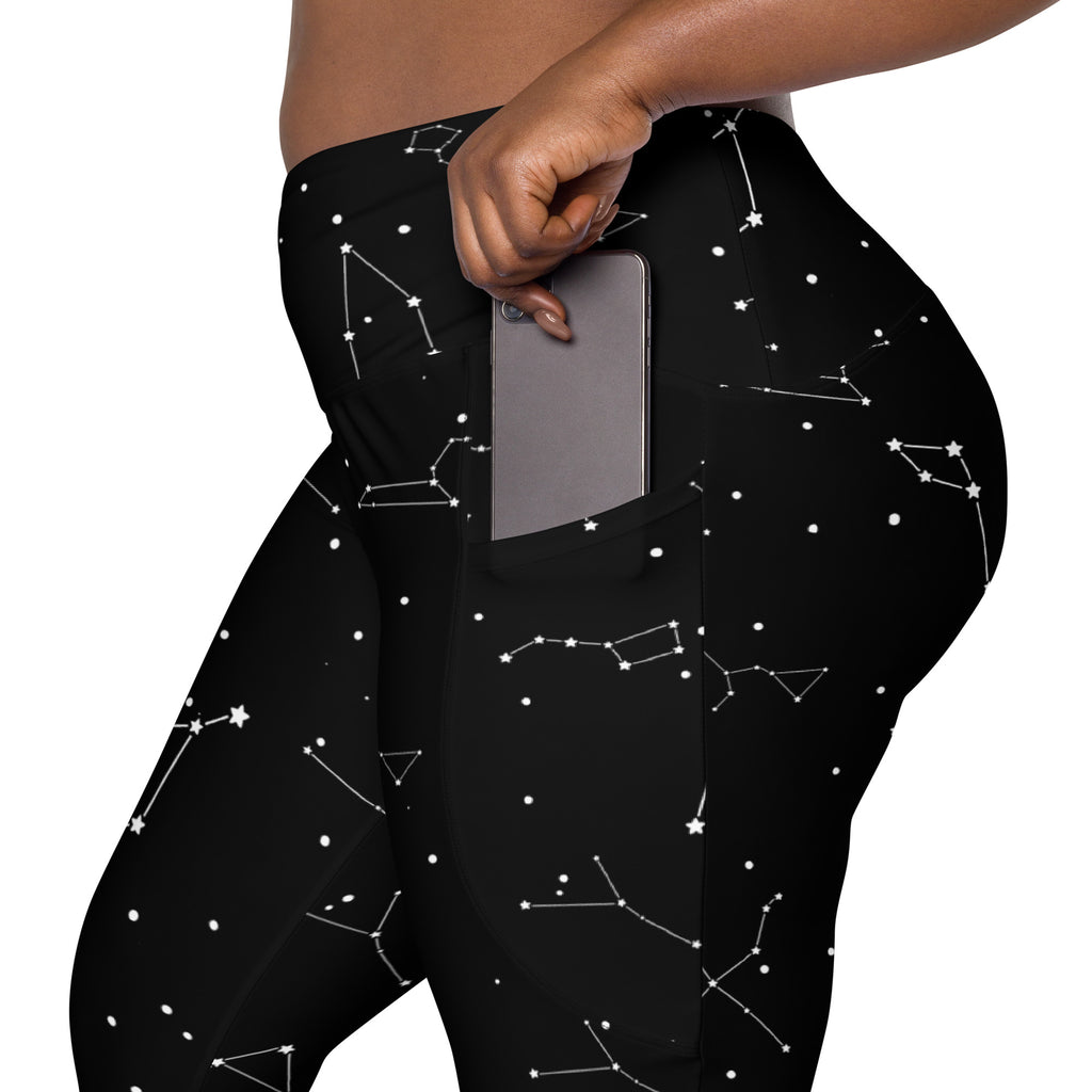 Black high-waisted women’s yoga leggings with white realistic constellation pattern soft compression and pockets