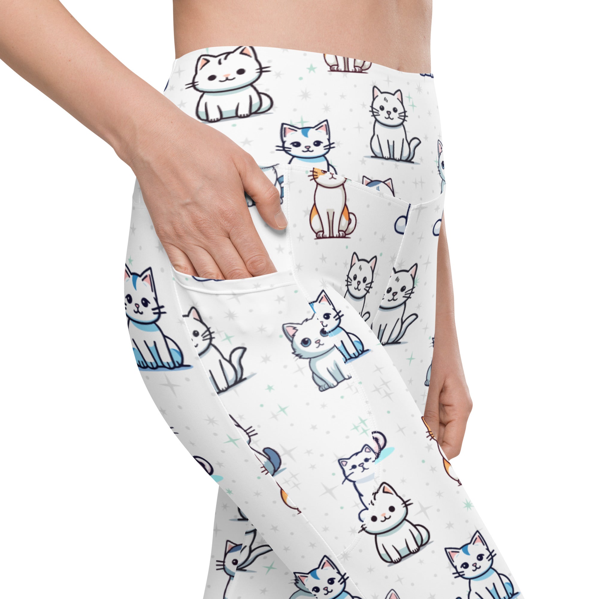 White women’s high-waisted yoga leggings with pockets featuring playful colorful cartoon cat patterns and blue accents